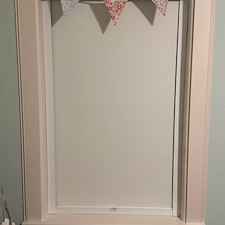 Perfect-Room-Darkening-Roller-Shades-with-Side-Tracks-on-Woodhead-St-in-Houston-TX 1